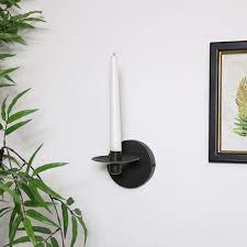 Get 5% in rewards with club o! Round Black Metal Wall Candle Holder