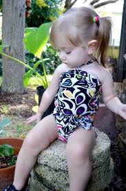 We've designed suits with every figure, age and style in mind, so you're sure to discover one you love. Baby Bathing Suit Black With Neon Flowers Wrap Around Swimsuit Etsy In 2021 Baby Bathing Suit Newborn Girl Black Bathing Suits