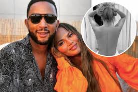 She even called out the tattoo artist when she posted it, writing the artist even responded in the comments. Chrissy Teigen Debuts New Back Tattoo Of John Legend Lyrics