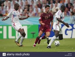 Gran actuación del maestro zizou en la semifinal de la copa del mundo 2006 ante portugal.great performance by maestro zizou in the semifinal of the 2006. Portugal S Cristiano Ronaldo Takes On France S Lilian Thuram R Stock Photo Alamy