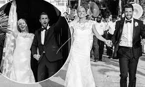 The bride wore a boatneck lela rose dress adorned with floral motifs, and a matching veil. Emily Vancamp Shares Wedding Snaps With Revenge Co Star Josh Bowman Daily Mail Online