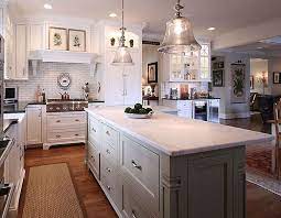 They may also incorporate a kitchen island, which can be extremely useful for food preparation and added storage. L Shaped Island Traditional Kitchen Pheasant Hill Design Kitchen Cabinets Grey And White Kitchen Design Home Kitchens