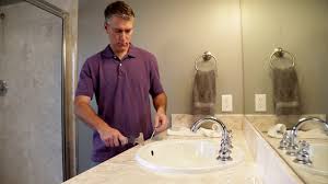 how to remove old caulking from kitchen