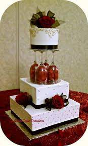 Wedding Cakes Using Wine Glasses Elegant Ivory Wedding Cake With Gold Black And Red Accents Wedding Cake Red Red Rose Wedding Cake Ivory Wedding Cake