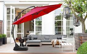 It features a center stand with several support bars connecting to the canopy. The 7 Best Patio Umbrellas 2021 Reviews Outside Pursuits