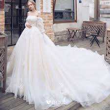 Short wedding dress designed in classical style. Elegant Champagne Wedding Dresses 2018 Ball Gown Off The Shoulder Long Sleeve Backless Appliques Lace Cathedral Train Ruffle