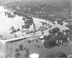 This Is A Photo Taken Of The Labor Day 1941 Flood In Chippewa Falls Lower Bridge Street Was Submerged Under Water And Ma Chippewa Falls Old Pictures Wisconsin