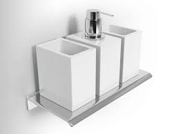 A triple model is perfect for installing in a shower, letting you fill the separate sections with shampoo, conditioner and shower gel. Diantha Wall Mounted Soap Dish By Alna Ceramic Toothbrush Holder Wall Mounted Soap Dispenser Wall Mounted Toothbrush Holder