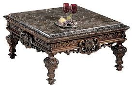 The Casa Mollino Coffee Table From Ashley Furniture Homestore Afhs Com Furniture On A Grand Marble Top Coffee Table Wood Cocktail Table Marble Coffee Table