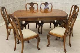 I'm a sucker for the ones with little kick pleats. Queen Anne Style Dining Suite Table And Chairs Antiques Atlas