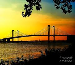 View from a bus of trucks and automobiles crossing the delaware memorial bridge march 20, 2015 in new castle, delaware. Sunset At The Delaware Memorial Bridge Photograph By Nick Zelinsky Jr