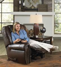 Brown power recliner with tray. Jordan Lay Flat Reclining Console Loveseat In Tobacco Leather By Catnapper 4669