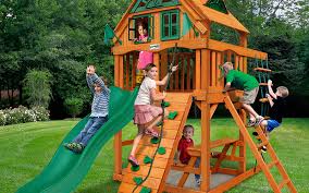 Portrait of a cute siblings having fun together on playground, brother and sister with pleasure spending summer holidays outdoors on backyard. Backyard Ideas For Kids The Home Depot