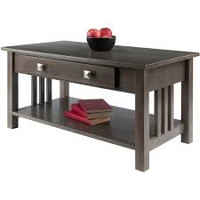 Made of solid mango wood that beautifully displays the natural grain of the wood, our anton coffee table is a modern take on rustic farmhouse style. Winsome Stafford Transitional Solid Wood Storage Coffee Table In Oyster Gray 16040