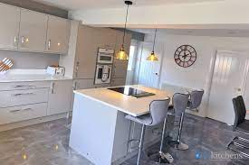 Light grey shaker kitchen white worktops cut. High Gloss Grey Gloss Real Kitchens
