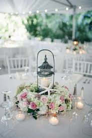 A beach composition of blue and coral sea urchins, starfish, driftwood, seashells, air plants and corals catches an eye. Best Wedding Beach Themes In 2020