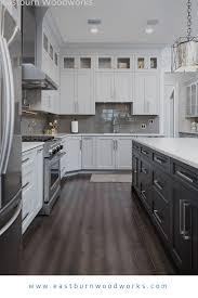 Two Toned Kitchen With White And Black Cabinetry On Shaker Doors By Eastburn Woodworks Dark Kitchen White Kitchen Shaker Kitchen Cabinets