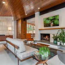 Chunky textured wooden mantel for your fireplace. 75 Beautiful Mid Century Modern Living Room With A Brick Fireplace Pictures Ideas June 2021 Houzz
