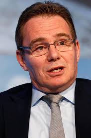 BHP chief executive Andrew Mackenzie heads for the door