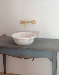 Bond tandem series gooseneck kitchen faucet and spray with guilloche lines lever handles. Velvet Linen Plumbing Fixtures