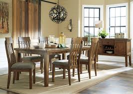 Depending on the measurements, round dining sets typically seat between 4 to 8 people. Flaybern Light Brown Extension Dining Table W 6 Side Chairs Tempo Collection