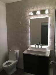 Round mirror, floating timber vanity and gunmetal tap wear. 75 Beautiful Modern Powder Room Pictures Ideas July 2021 Houzz