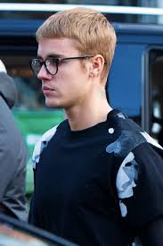 Except for his original shaggy swoop hairstyle, his other styles all share similarities where they are short on the sides and back, and long on the top. Justin Bieber Darker Hair Color
