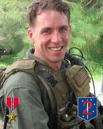 SSgt David P. Day. Born in Littleton, CO, Day enlisted in the Marine Corps  in September 2003. He began his career as a rifleman and was later assigned  to 1st Reconnaissance Battalion's