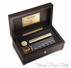 A)six months for common music box movements, 12 months for luxury music box movement. Reuge Raya 72 Note Grand Music Box Solid Chocolate Oak Finish Music Box Music Box Jewelry Dancing Ballerina Music Box