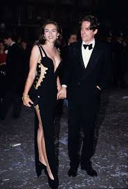 Elizabeth Hurley Caught The Attention Of Media And Fashion Critics With This Versace Safety Pin Dress She Wore Iconic Dresses Celebrity Dresses Versace Gown