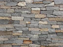 Thanks to lightweight veneers, it gets easier by the day to dress up a room shown: Newport Mist Ledge Stoneyard Stone Facade Stone Veneer Thin Stone Veneer