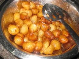 Image result for ‫لقمة القاضي‬‎