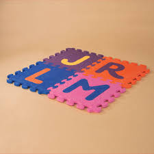 This educational set includes letters from a to z and . Beautifloor Alphabet Foam Tiles B Toys