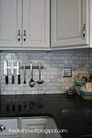 This Backsplash With Light Grey Cabinets Kitchen Design Kitchen Remodel Updated Kitchen