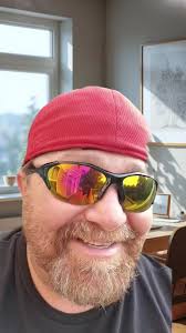 Child Ride inside A Tire Down The Driveway