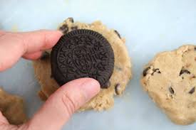 Poppin' fresh, more widely known as the pillsbury doughboy, is an advertising mascot for the pillsbury company, appearing in many of their commercials. Oreo Stuffed Chocolate Chip Cookies Mom Loves Baking