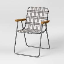 The folding lawn chairs make the most sense and you can fold and store them in a limited space when not used. Folding Patio Webstrap Chair Gray Room Essentials Target