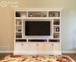 This Is My Diy Built In Wall Unit Made For 60 Tv I Used Three In Stock Brown Maple Home Depot Upper Built In Wall Units Built In Tv Wall