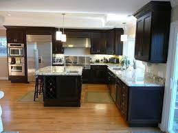 1800' of site finished hardwood floors, natural white oak. Kitchen With Espresso Stained Cherry Cabinets Granite Counter Tops And Red Oak Hardwoo Stained Kitchen Cabinets Kitchen Inspirations Espresso Kitchen Cabinets