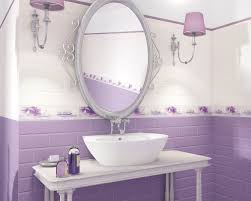 Here are some purple bathroom ideas and design tips: White And Lavender Bathroom Covered With Stack Bond Pattern Tiles With A Floral Motif Ceramika Paradyz