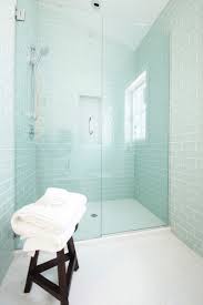 Subway tile is classic, elegant, and very versatile. Blue Glass Subway Tile Shower Design Ideas