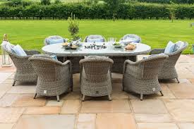 Browse the collection of dining tables and chairs at homebase. Maze Rattan Oxford 8 Seat Oval Ice Bucket Dining Set With Heritage Chairs The Clearance Zone