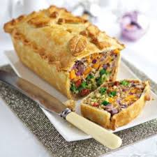 Serve with a crisp green salad and plenty of garlic bread. Vegetarian Christmas Dinner 25 Delicious Alternatives To Nut Roast Vegetarian Christmas Dinner Vegetarian Vegan Recipes Vegan Recipes