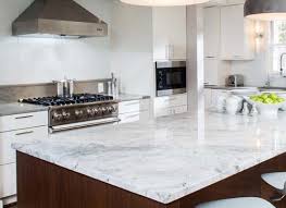 It has a white primary base with gray veins and flecks as design. Quartzite Kitchen Countertop Quartzite Countertops By Max Granite