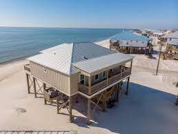 Dauphin island guards the entrance to mobile bay, and it's about a thirty mile drive across water and land to gulf shores. 057 Summer Wave Dauphin Island Al Acpinfo