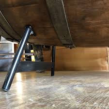 It has a top that opens and closes on a hinge so you can use the barrel as a storage chest! Half Barrel Coffee Table The Oak Barrel Company