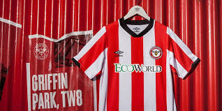 Spurs will wear a similar dark blue kit to their 2018/19 design (image: Brentford 2020 21 Home Football Kits Shirts