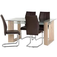 Matching chairs are padded with leatherette seats with a sturdy table supported by fo ur post legs. Milan Glass Rectangular Dining Table 4 Faux Leather Chairs Set Freemans