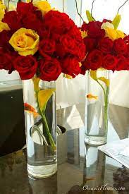Red And Yellow Roses Large Centerpiece With A Goldfish Red And Yellow Roses Yellow Wedding Decorations Red Yellow Weddings