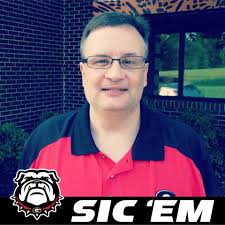 Was the photo of Grant Field taken at sunrise or sunset?